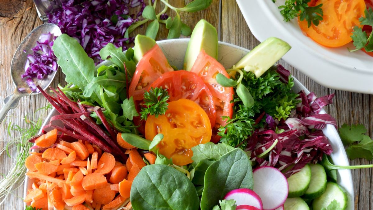 A bowl filled with colourful fruit and vegetables
